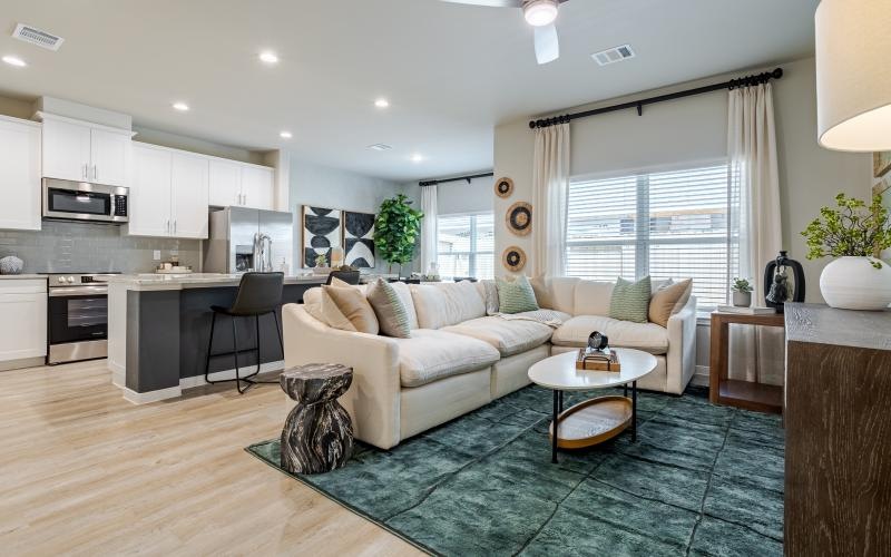 a living room with a couch and a table