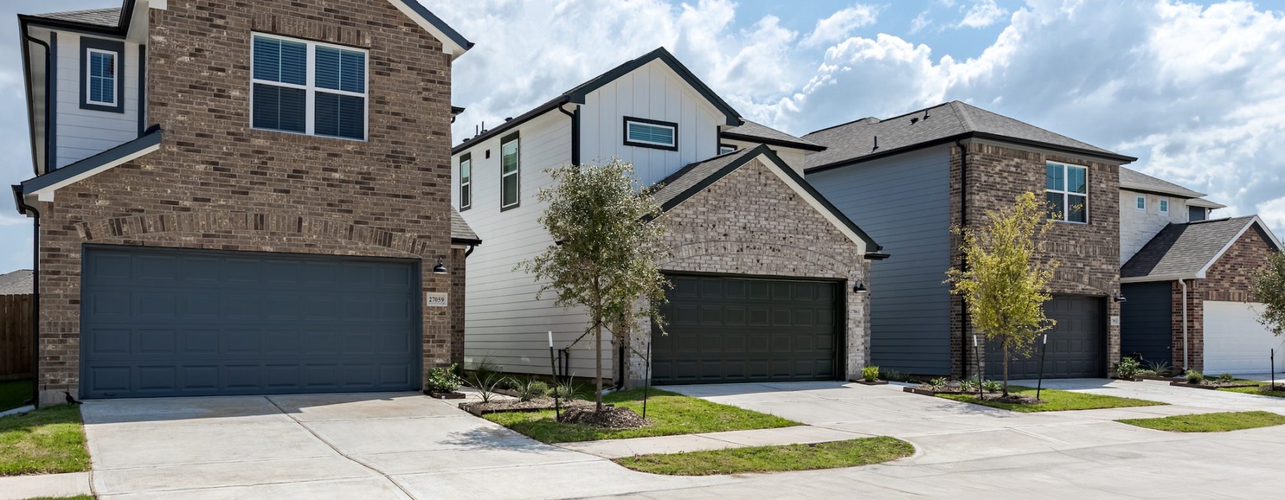 a group of homes with private garages