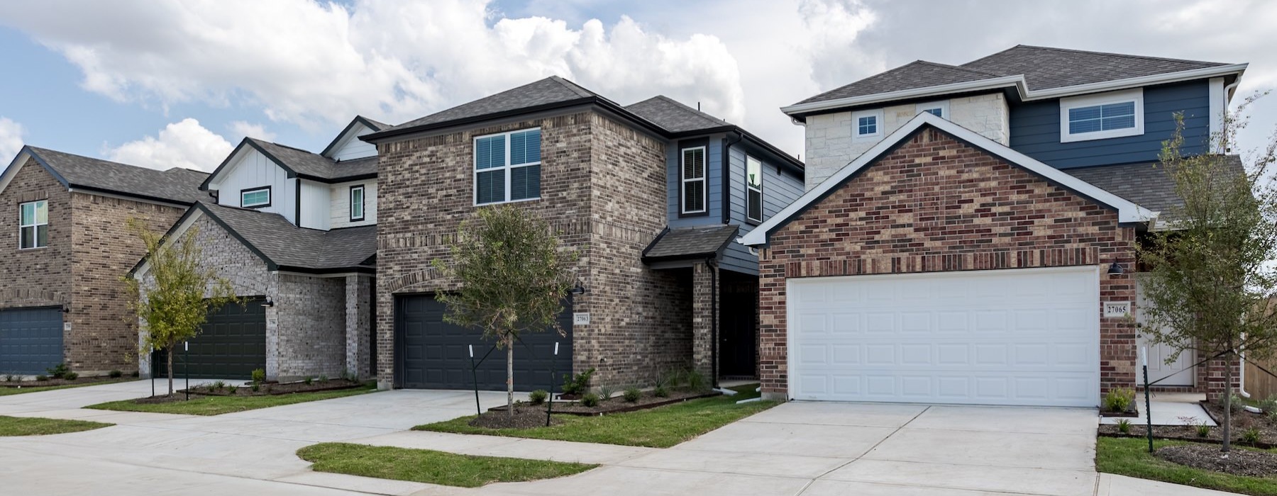 row of houses with garages